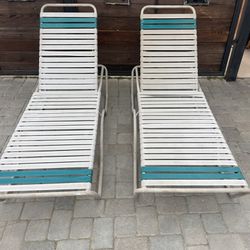 two Resort Style Lounge Chairs