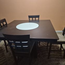Dining Table  51   1/2  X  51  1/2,and 4 chairs