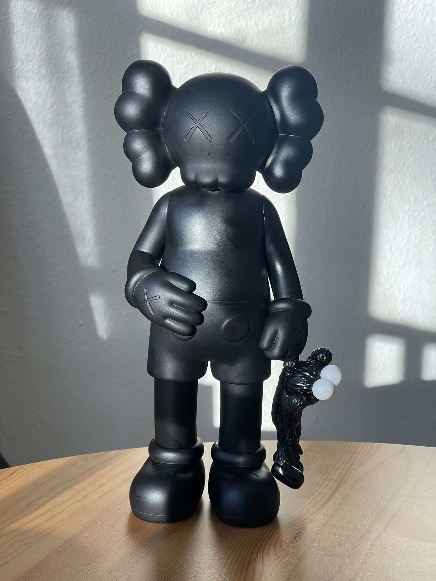 Kaws Share