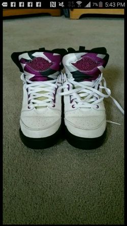 White, black and purple Jordans