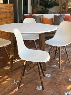 White patio table and chairs