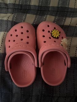 Bundle Of Crocs And A Toy