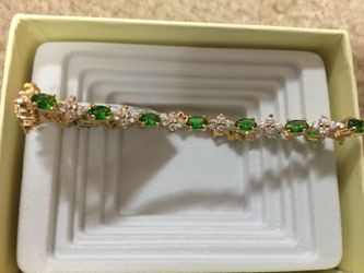 sterling silver bracelet with green stones