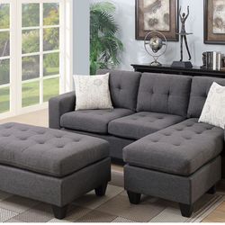 GREY COMPACT SECTIONAL AND OTTOMAN WITH ACCENT PILLOWS