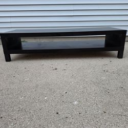 Ikea LACK Black
TV Stotage  unit
58.5 inches long 
14 inches tall 
21.5 inches deep