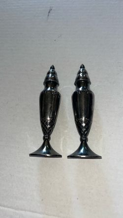 Salt and pepper shakers both for $20
