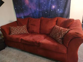 Red couch with pull out bed