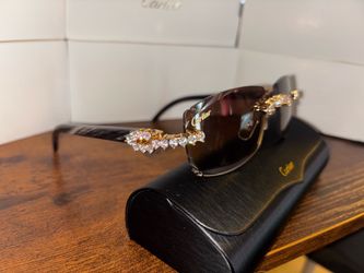 CARTIER BLACK BUFFS
