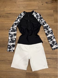 Alo Yoga white shorts. Some pink laundry stains on the front right side only. Both size Medium. Rash-guard black & white palm tree print long sleeve t
