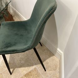 Green suede hand stitched chairs