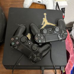 PS4 Slim and 3 Wireless Controllers