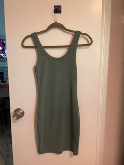 Womans fitting turquoise dress