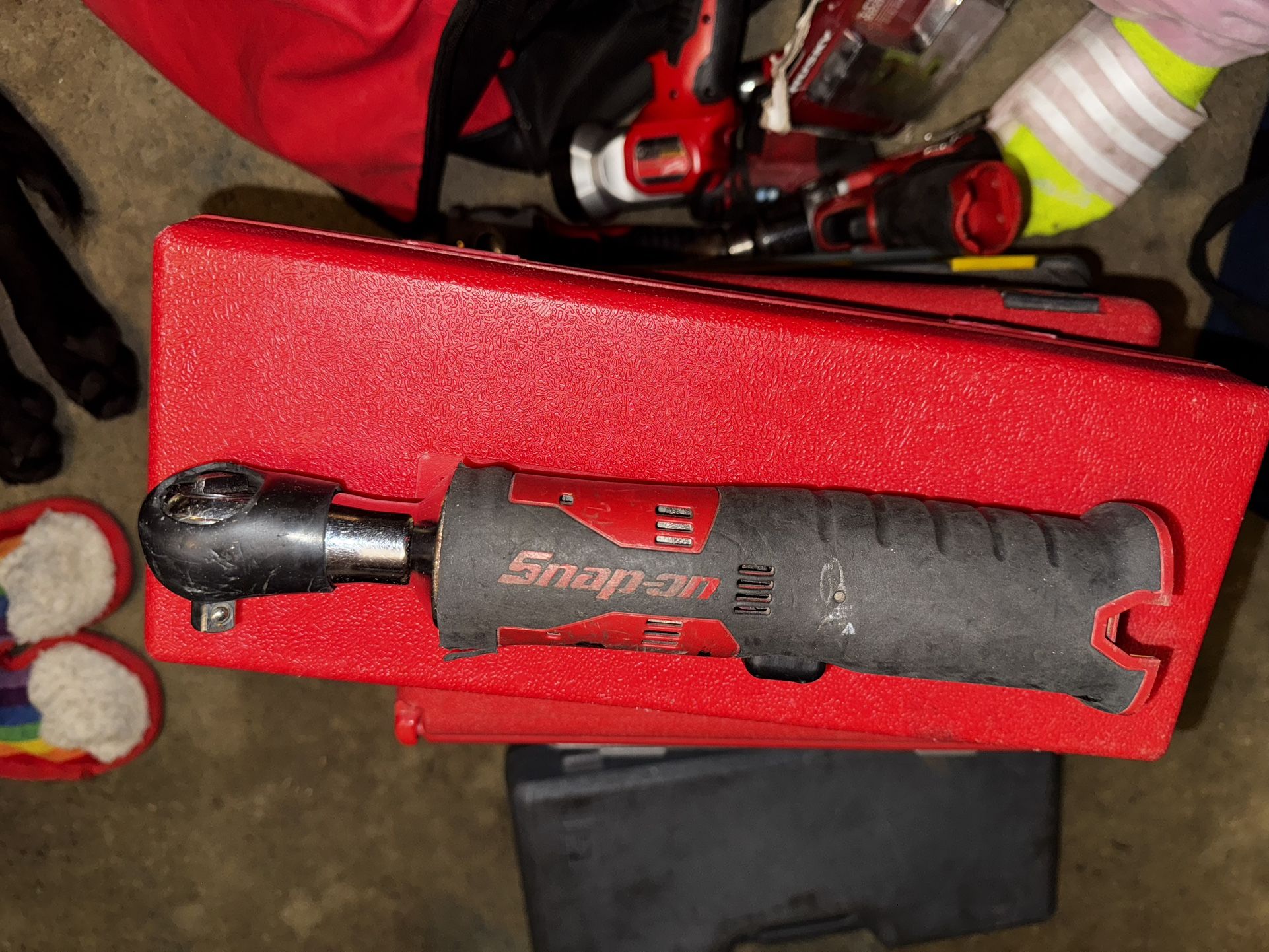 a Snap-on 14.4V 3/8" Drive RED MicroLithium Cordless Ratchet