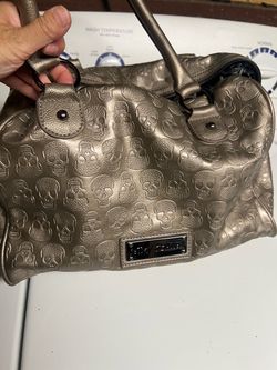 Vintage Betsy Johnson, metallic champagne, arm purse with skulls, amazing condition