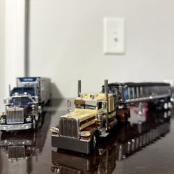 Several 1/64 Scale Dcp Trucks 
