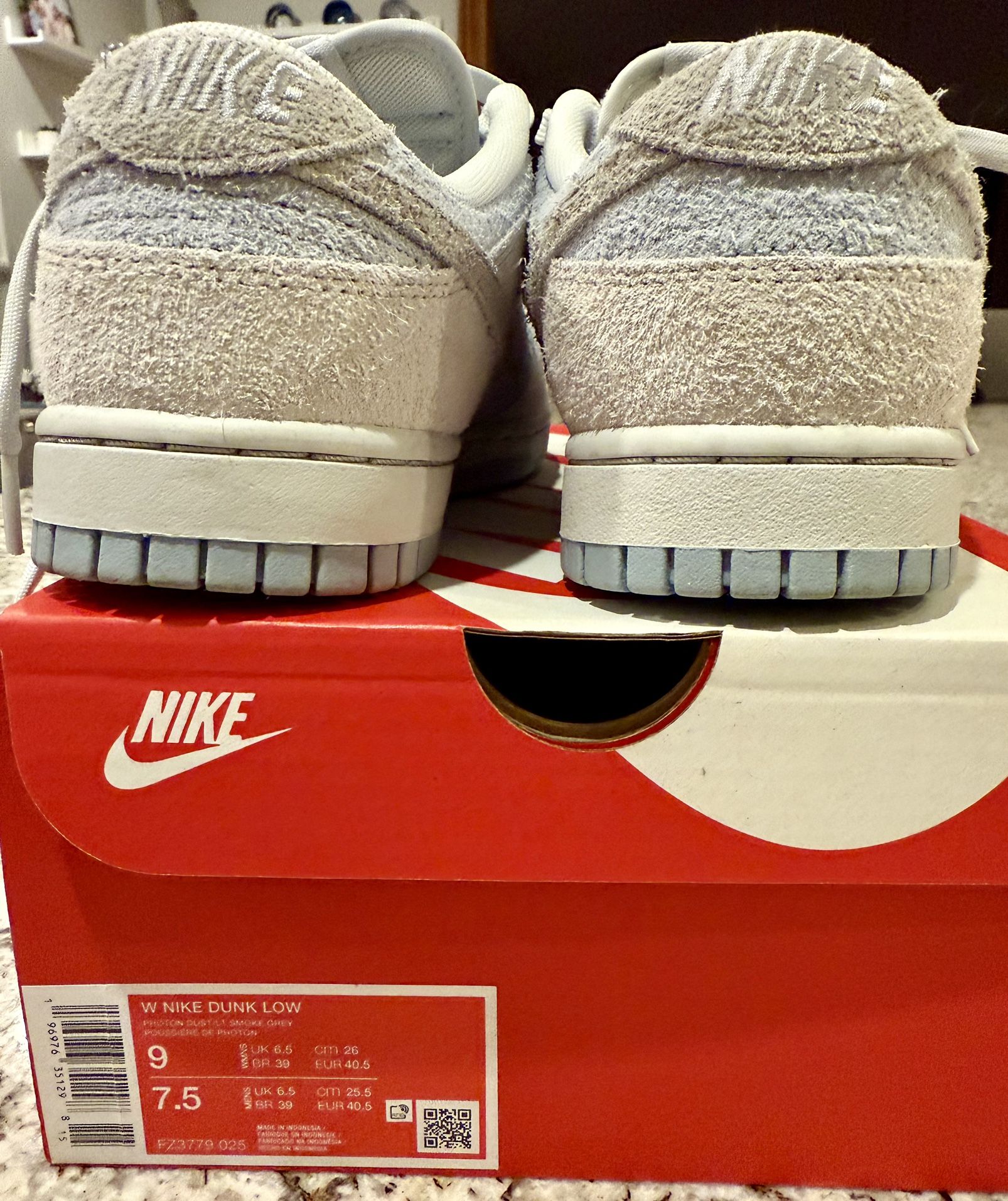 Nike Dunk SB Low - Size W 9 / M 7.5, in a "Photon Dust & Summit White" suede colorway.