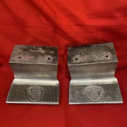 pair of CARR Work Truck Steps or underbody access steps made of polished or cast aluminum, 