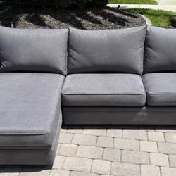 Charcoal Gray Sectional Sofa with Left-Facing Chaise. Price Including Delivery