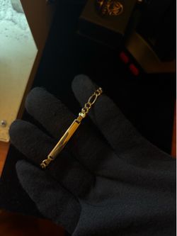 14KT gold figaro link ID bracelet