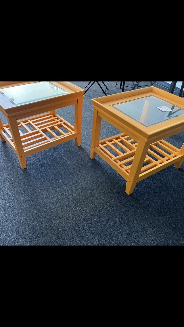 Two yellow end tables