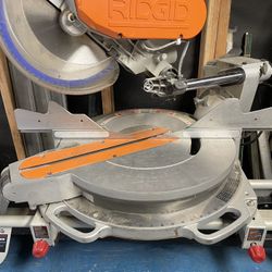 Ridgid 12” Duel Bevel Sliding Miter Saw w/stand and new 80 Tooth Fine Cut Blade