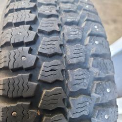 4 Snow Tires With Studs For 1990s Honda Civic Mounted On Rims