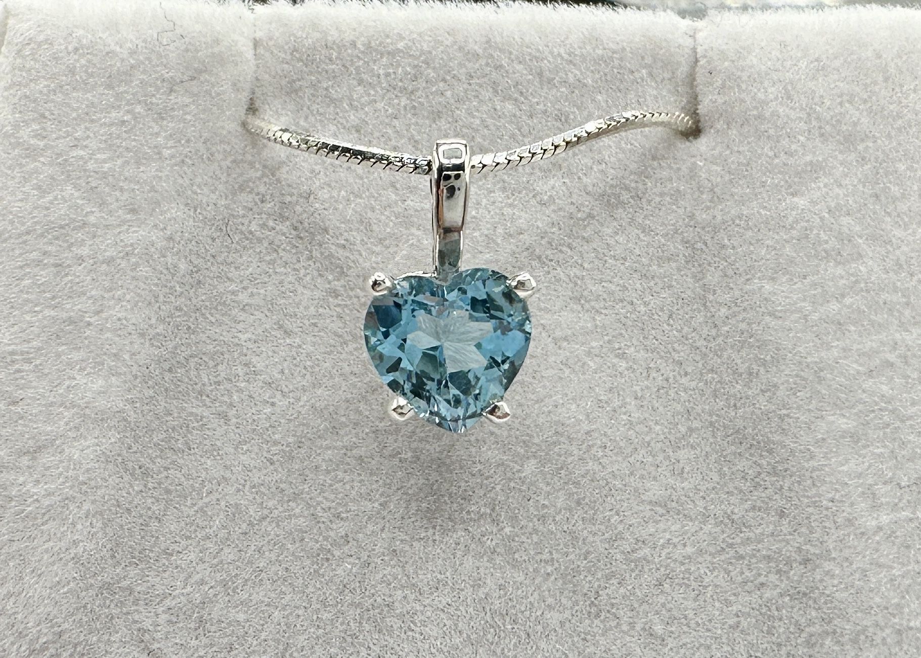 Sterling Silver Blue Topaz Heart Pendant And Chain