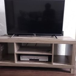 Roku Tv And TV Stand 