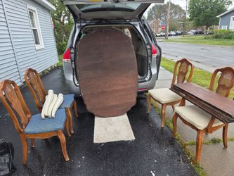 Dining Table with 4 chairs and 4 leaves
