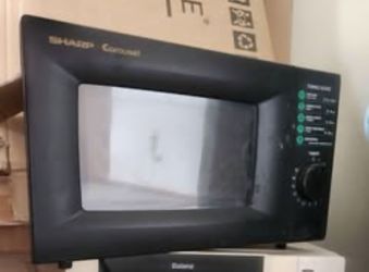 SHARP Carousel microwave still works fine(free pick up or meet or delivery when I have time)