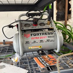 Fortress 2 Gallon Air Compressor And Reel 