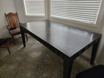 Dining table Has a leaf  to extend length
