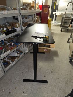 Height adjustable sit stand