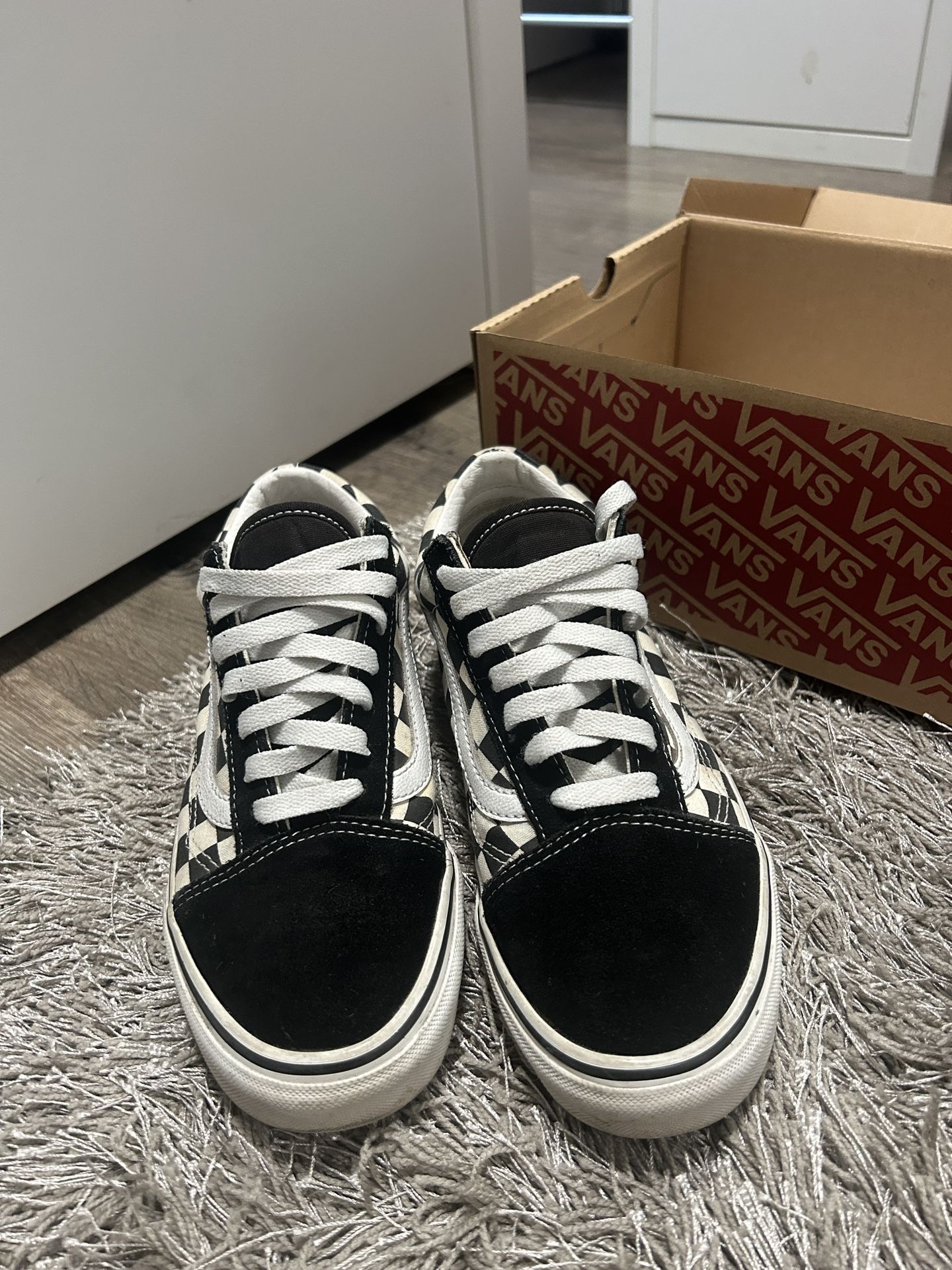 Black and white old school checkered vans