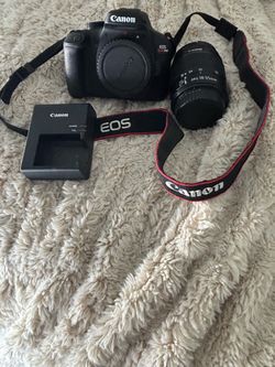 Canon EOS Rebel T100 DSLR Camera with 18-55mm Lens