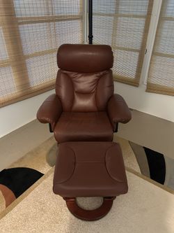 2 Brown Leather Rocker Chairs