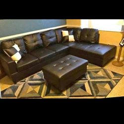 New Black Leather Sectional And Ottoman 