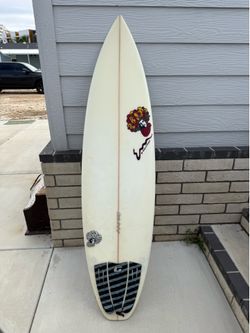 6'4” x 19.5”  x 2”5/8” Chuck Dent Surfboard no fins