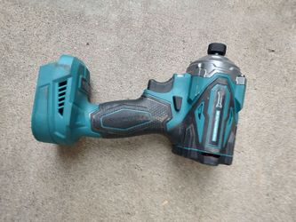 Cordless 1/4" impact drill.  Quick disconnect for hex bits.  Takes Makita 18v batteries.