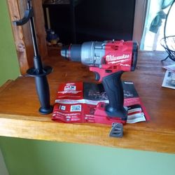 Milwaukee 18 V New. Fuel.  Hammer Drill.  2 Speed.   1/2". Brushless. W/ Handle 
