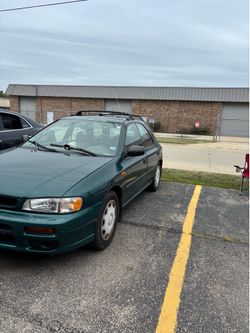 2000 Subaru 4 door green