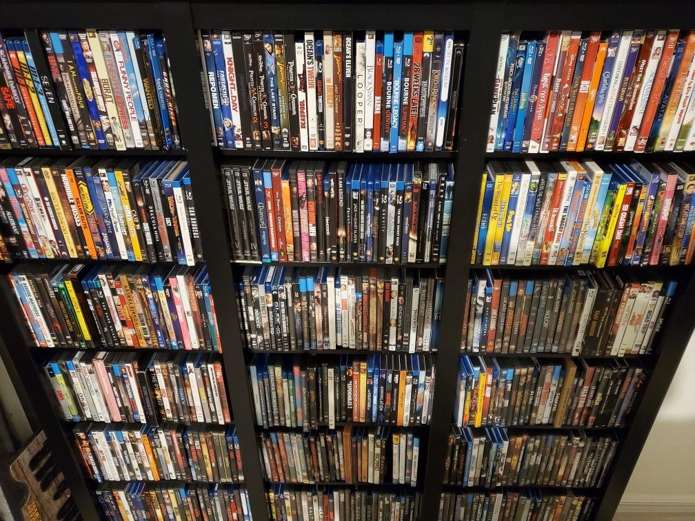 500+ DVD collection + display rack