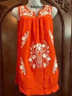 Girls orange cotton dress with white floral embroidery, size M