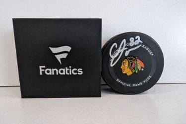 Caleb Jones Signed Autographed Chicago Blackhawks Logo Hockey Puck Fanatics