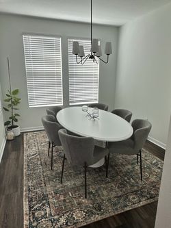 White Oval Dining Table — Seats 6