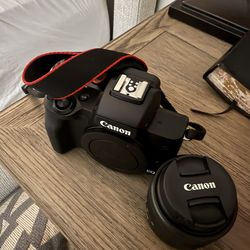 Canon Eos M50 With Default Lens, Charger, Strap, And Box