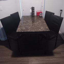 Table And 4 Chairs 