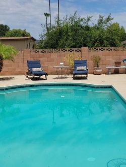 Two Adjustable wood Patio Loungers w/cushions