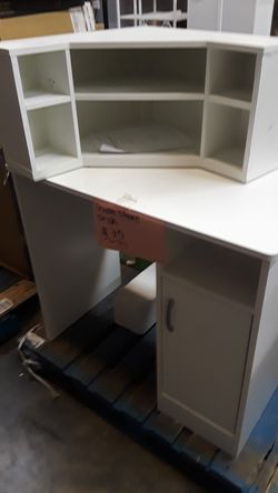 Small desk including wall unit