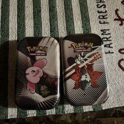 2 Black Bolt & White Flare Tins 
